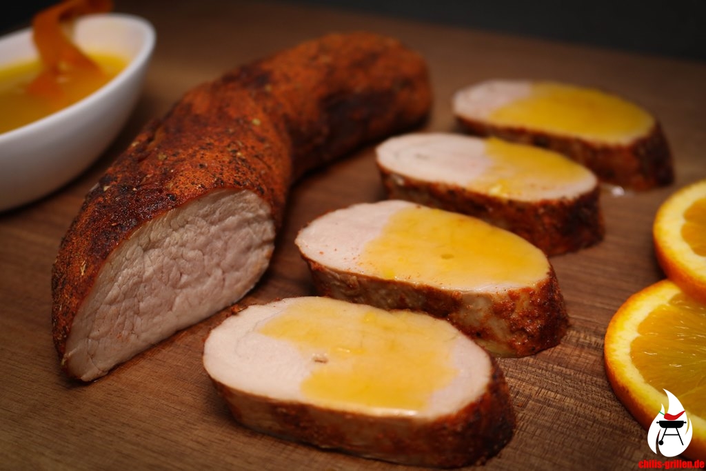 Auf Zedernholz geräuchertes Schweinefilet mit Orangensauce